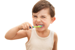 Boy brushing teeth 